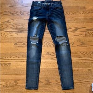Mid rise distressed jeans